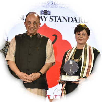 Swastika Mukherjee receives award from Dr Subramanian Swamy