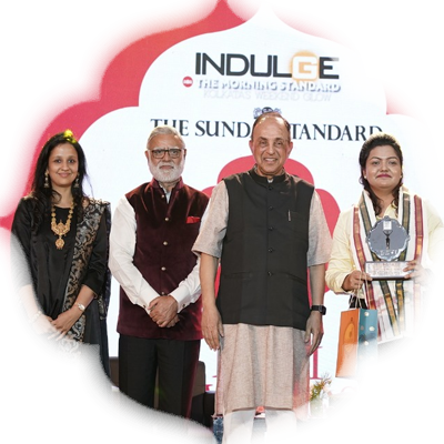 Debarati Mukhopadhyay receives award from Dr Subramanian Swamy